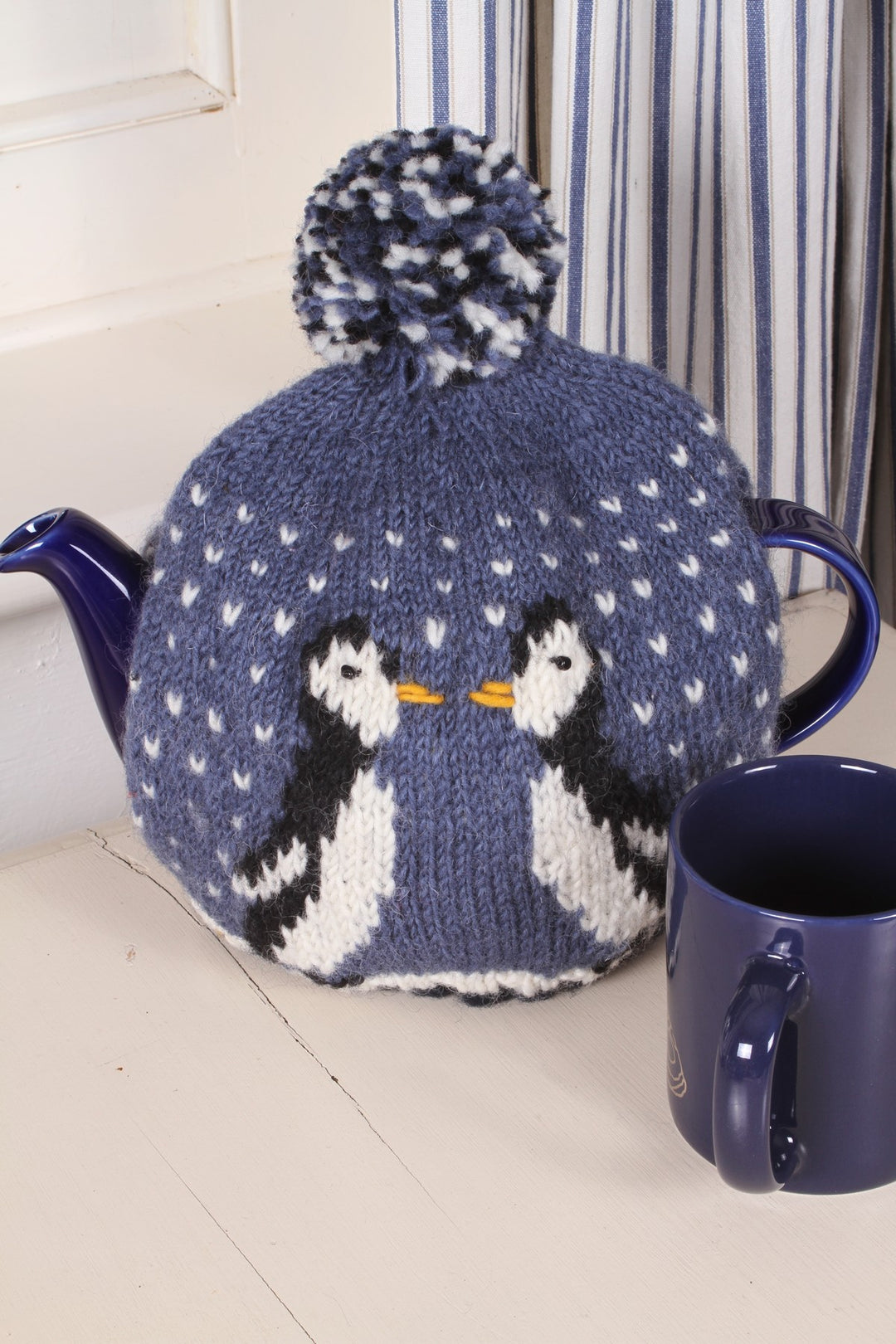Waddle of Penguins Tea Cosy by Pachamama Knitwear
